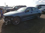 2021 Bmw 330xi  Blue vin: 3MW5R7J04M8B93443