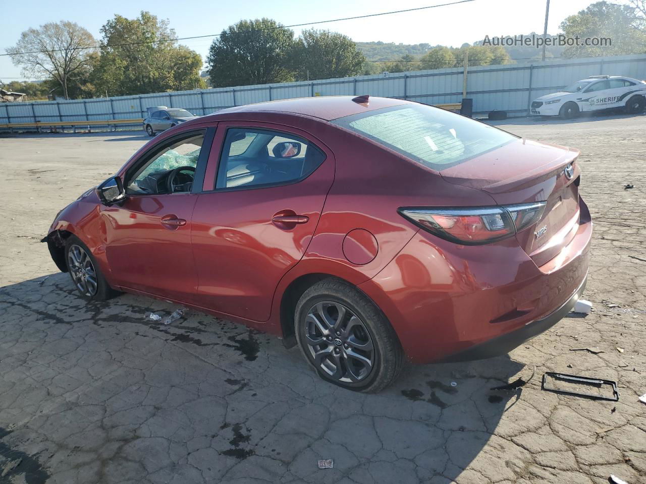 2019 Toyota Yaris L Burgundy vin: 3MYDLBYV3KY509305