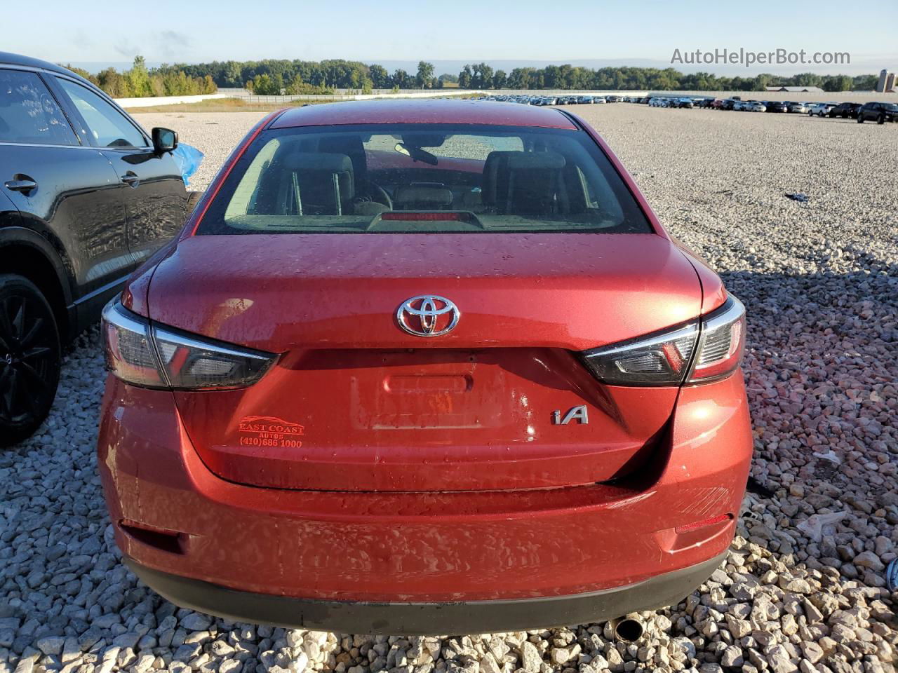 2018 Toyota Yaris Ia  Бордовый vin: 3MYDLBYV5JY312781