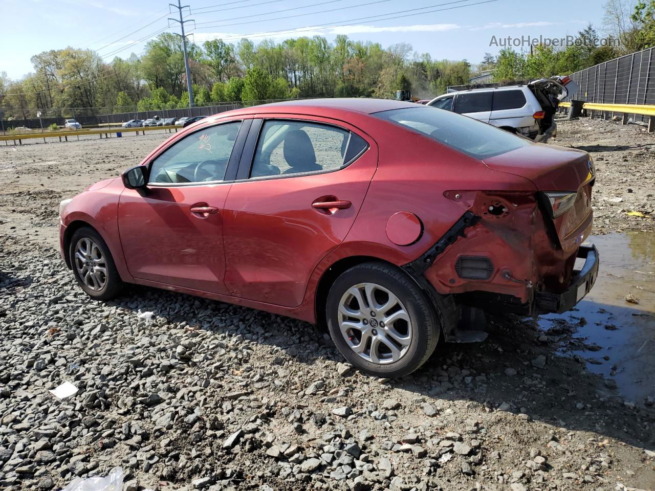 2018 Toyota Yaris Ia  Red vin: 3MYDLBYV5JY318354