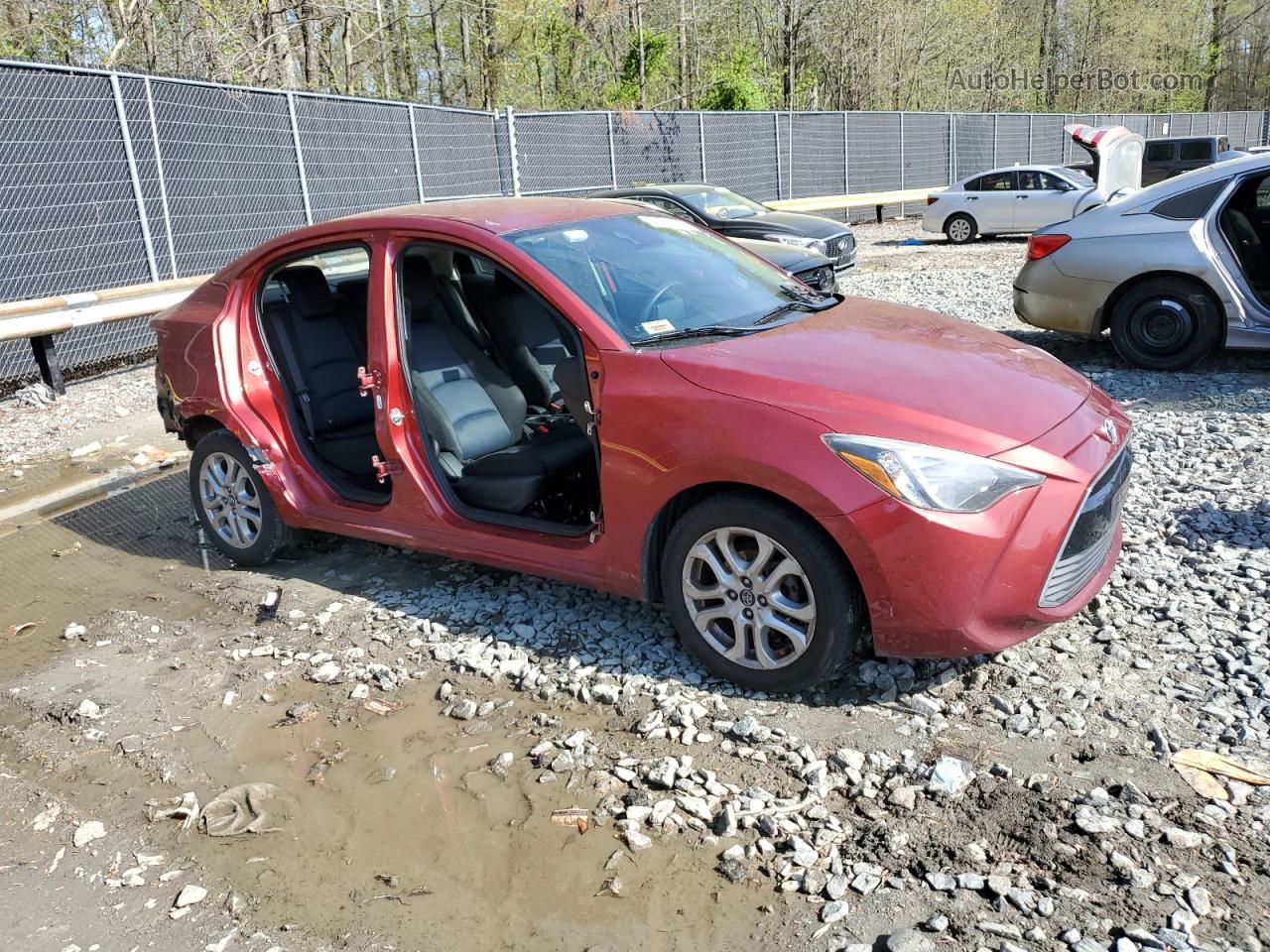 2018 Toyota Yaris Ia  Red vin: 3MYDLBYV5JY318354