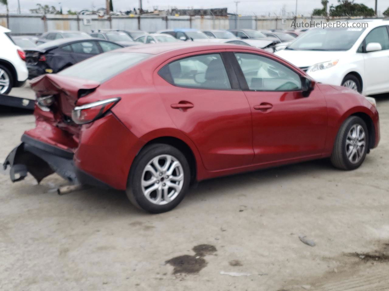 2018 Toyota Yaris Ia  Red vin: 3MYDLBYV5JY322193