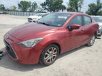 2018 Toyota Yaris Ia  Red vin: 3MYDLBYV8JY322110