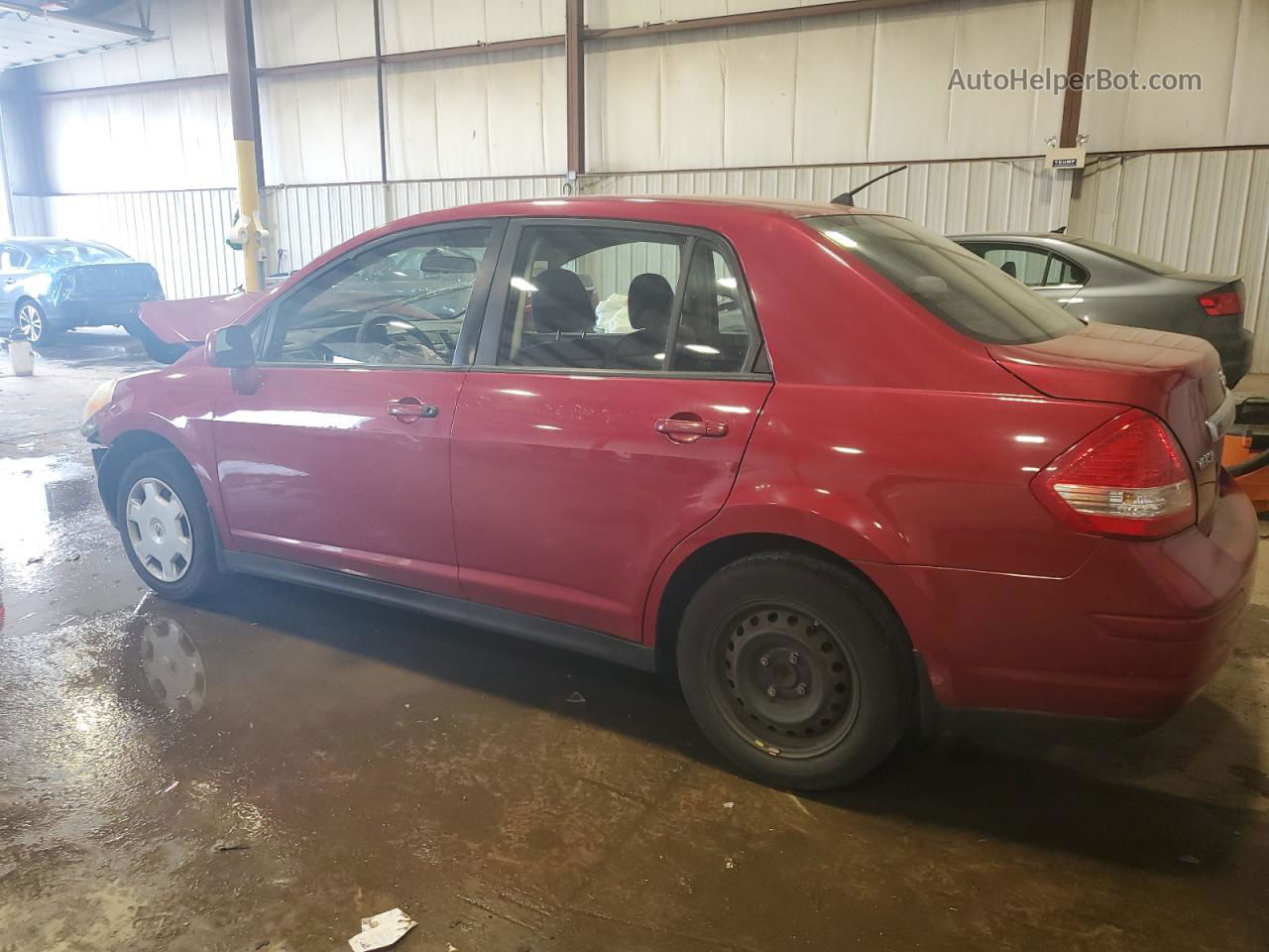 2009 Nissan Versa S Burgundy vin: 3N1BC11E69L450013