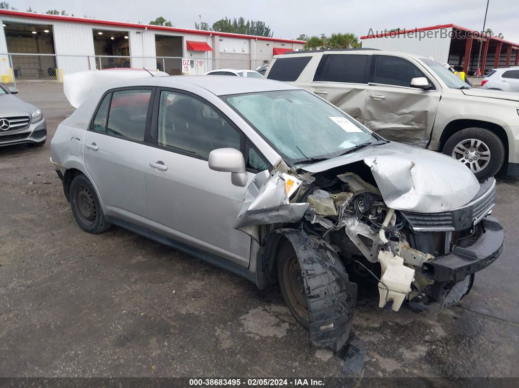 2009 Nissan Versa 1.8s Серебряный vin: 3N1BC11E99L441404