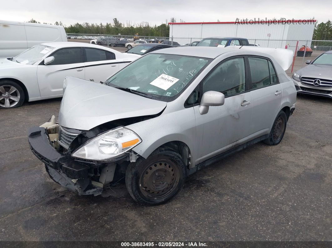 2009 Nissan Versa 1.8s Серебряный vin: 3N1BC11E99L441404