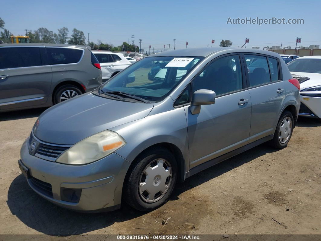 2009 Nissan Versa 1.8s Серебряный vin: 3N1BC13E09L402004