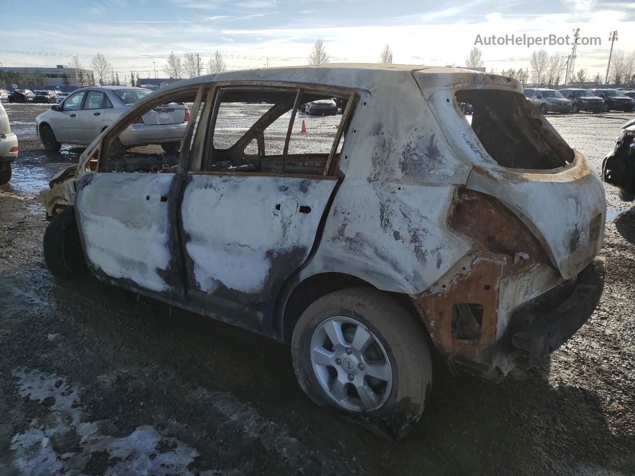 2009 Nissan Versa S Burn vin: 3N1BC13E29L380426