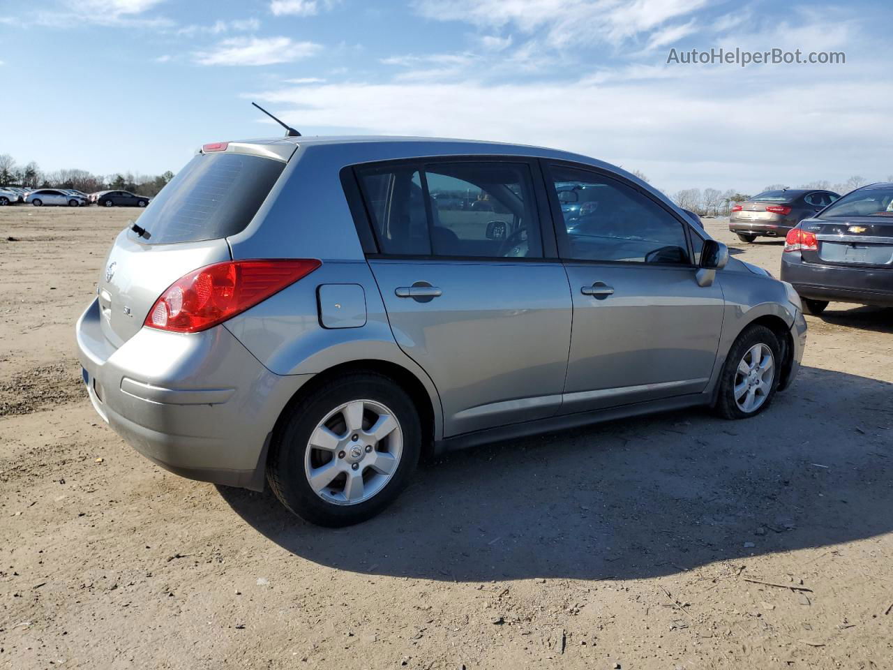 2009 Nissan Versa S Серебряный vin: 3N1BC13E99L419190