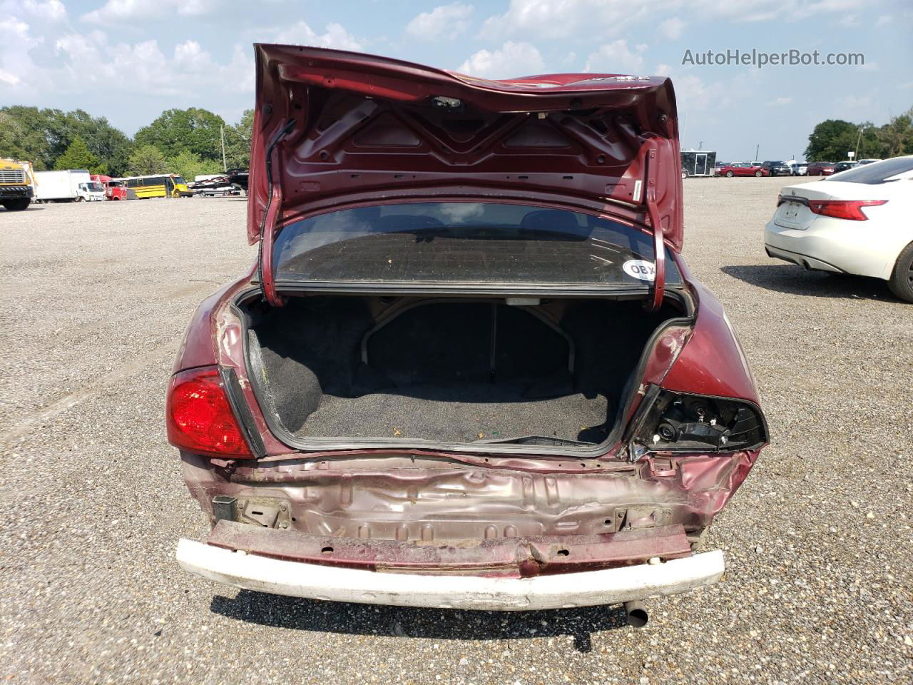 2005 Nissan Sentra 1.8 Red vin: 3N1CB51D95L458123