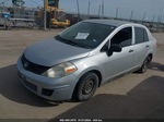 2009 Nissan Versa 1.6 Серебряный vin: 3N1CC11E09L450352