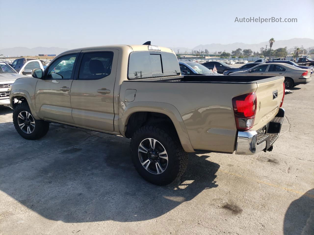 2019 Toyota Tacoma Double Cab Желто-коричневый vin: 3TMAZ5CN8KM086978