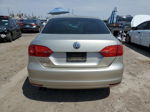 2014 Volkswagen Jetta Base Gold vin: 3VW2K7AJ0EM265344