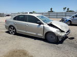 2014 Volkswagen Jetta Base Золотой vin: 3VW2K7AJ2EM234547