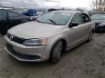 2013 Volkswagen Jetta Base Tan vin: 3VW2K7AJXDM257928