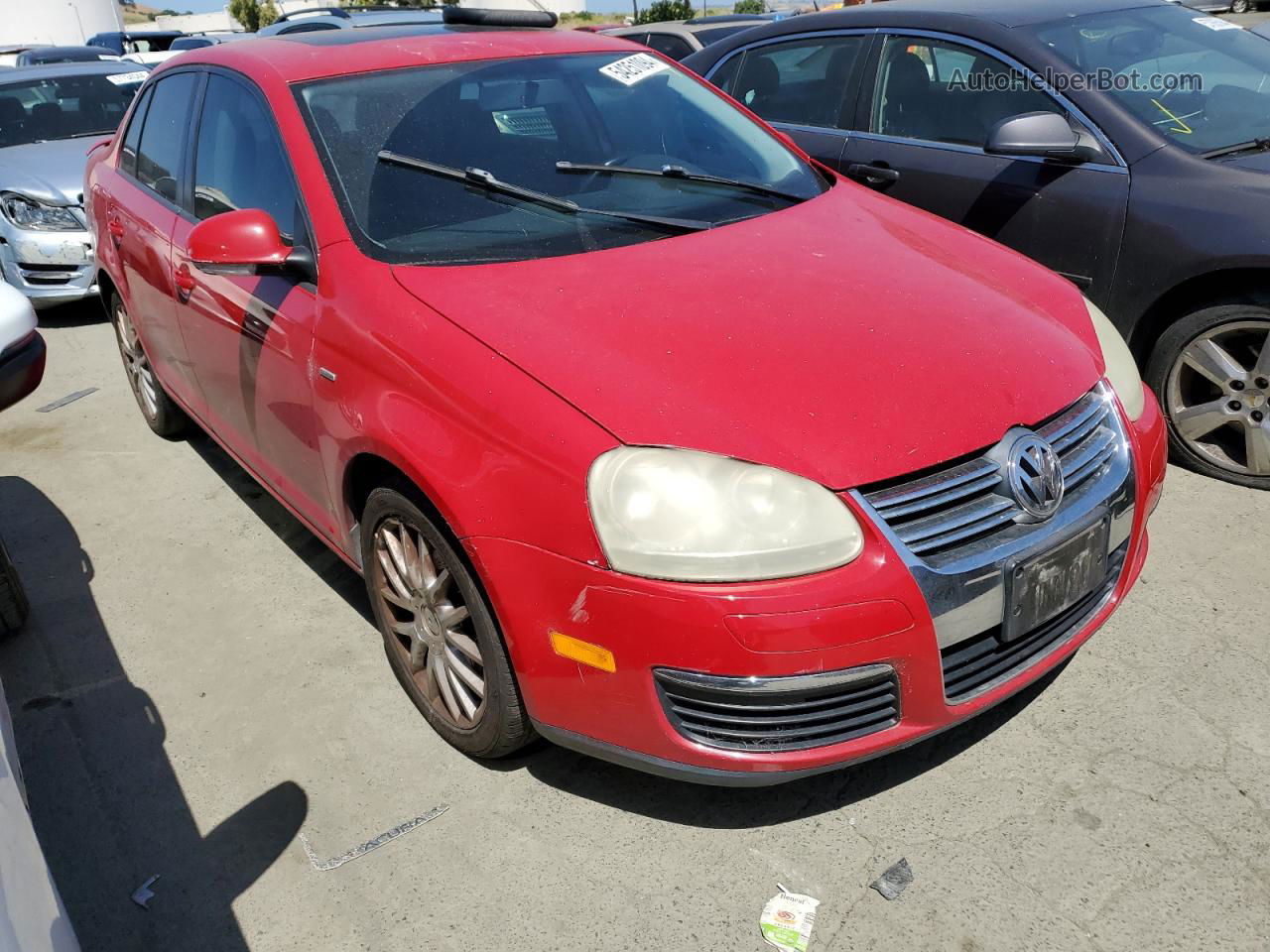 2009 Volkswagen Jetta Wolfsburg Red vin: 3VWRA71KX9M049436