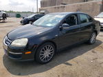 2009 Volkswagen Jetta Wolfsburg Black vin: 3VWRJ71K09M095860