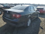 2009 Volkswagen Jetta Wolfsburg Черный vin: 3VWRJ71K49M008204