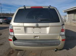 2010 Mercury Mariner  Gold vin: 4M2CN8B73AKJ25145