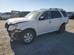 2010 Mercury Mariner  White vin: 4M2CN8B75AKJ26233