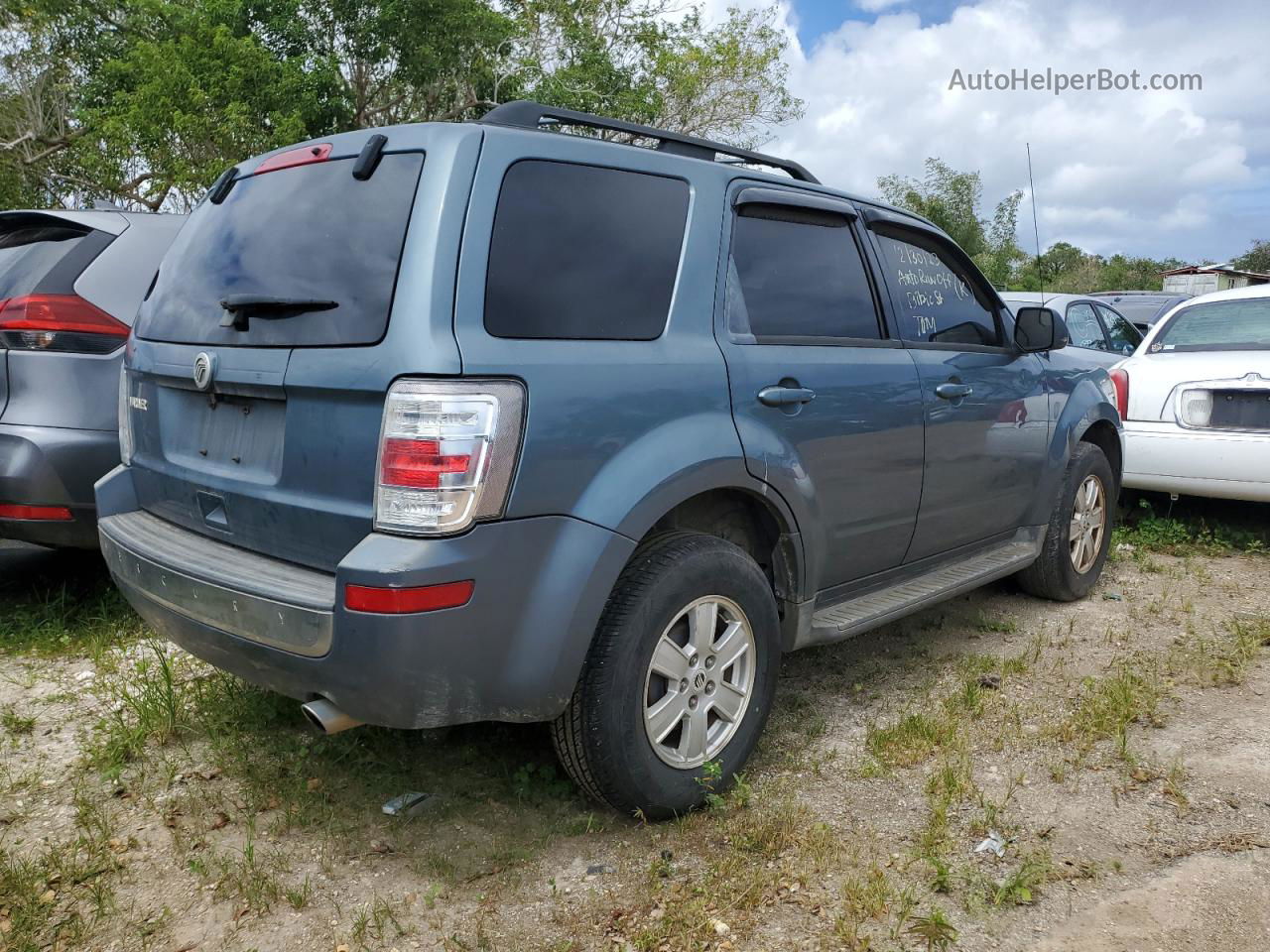 2010 Mercury Mariner  Blue vin: 4M2CN8B79AKJ28695