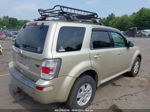 2011 Mercury Mariner   Золотой vin: 4M2CN8B79BKJ01322