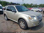 2011 Mercury Mariner   Золотой vin: 4M2CN8B79BKJ01322