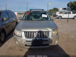 2011 Mercury Mariner Premier Gold vin: 4M2CN8HG1BKJ06831