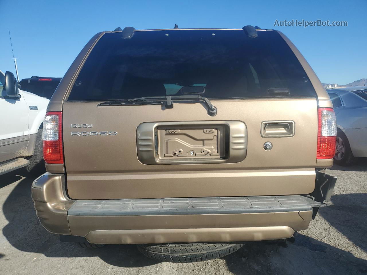 2001 Isuzu Rodeo S Tan vin: 4S2CK58W414325889