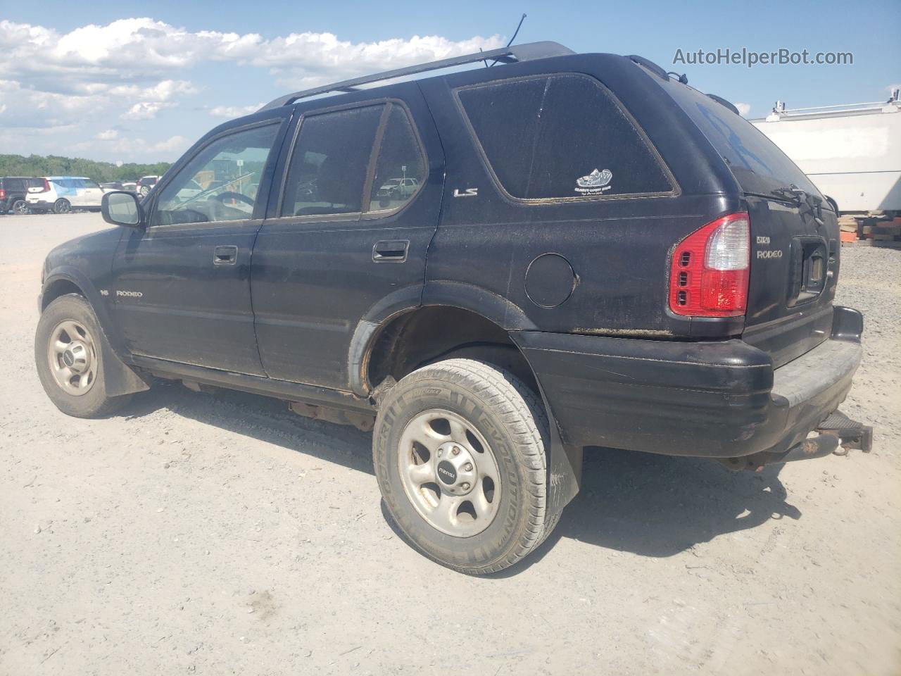 2001 Isuzu Rodeo S Black vin: 4S2DM58W614329392