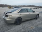 2016 Toyota Camry Le Золотой vin: 4T1BF1FK4GU117388