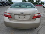 2009 Toyota Camry Base Золотой vin: 4T4BE46K79R083847