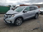 2017 Honda Pilot Touring Серебряный vin: 5FNYF5H93HB038854