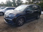 2017 Honda Pilot Elite Черный vin: 5FNYF6H07HB055311