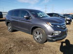 2017 Honda Pilot Exl Серый vin: 5FNYF6H56HB059829