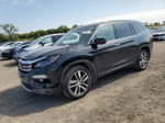 2017 Honda Pilot Touring Черный vin: 5FNYF6H93HB065252