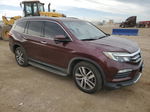 2016 Honda Pilot Touring Burgundy vin: 5FNYF6H94GB121889