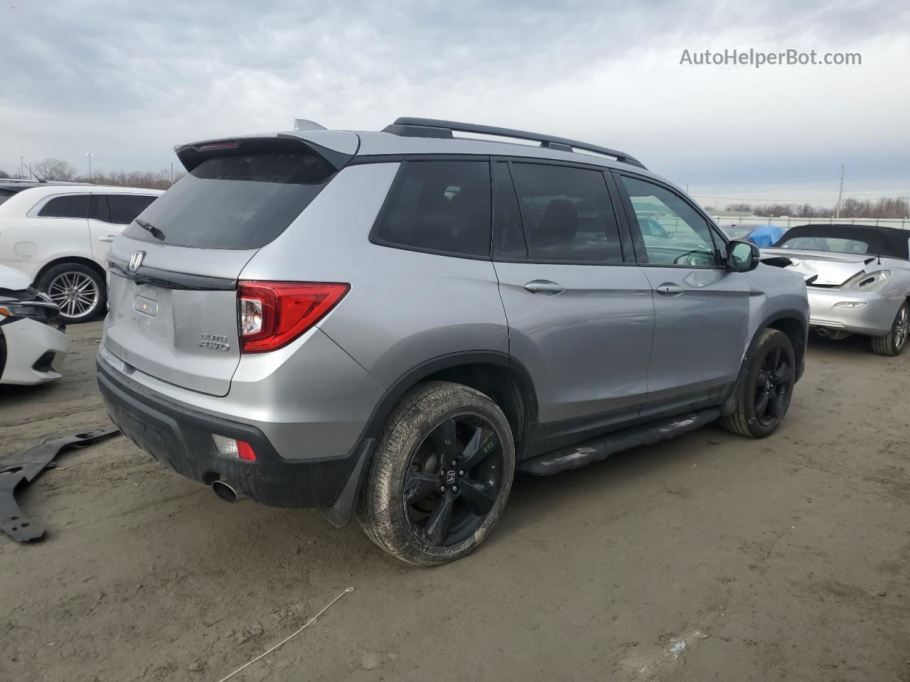 2019 Honda Passport Elite Silver vin: 5FNYF8H05KB007633