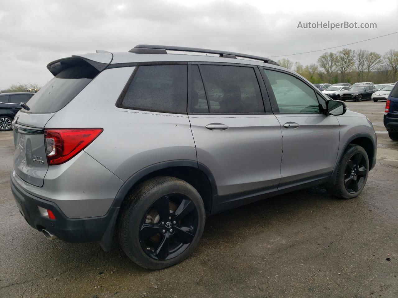 2019 Honda Passport Elite Silver vin: 5FNYF8H05KB009396