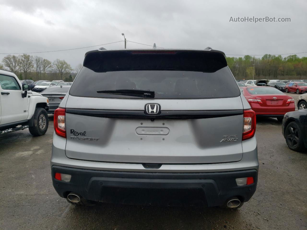 2019 Honda Passport Elite Silver vin: 5FNYF8H05KB009396