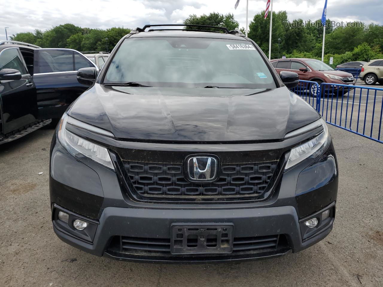 2019 Honda Passport Elite Черный vin: 5FNYF8H07KB017628