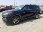 2021 Toyota Highlander Hybrid Xle Черный vin: 5TDHARAH1MS507761