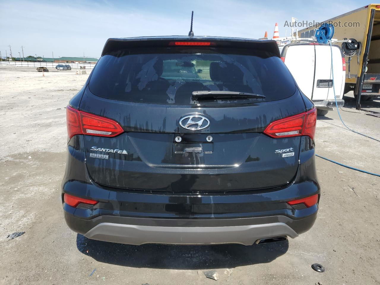 2018 Hyundai Santa Fe Sport  Черный vin: 5XYZTDLB5JG556710