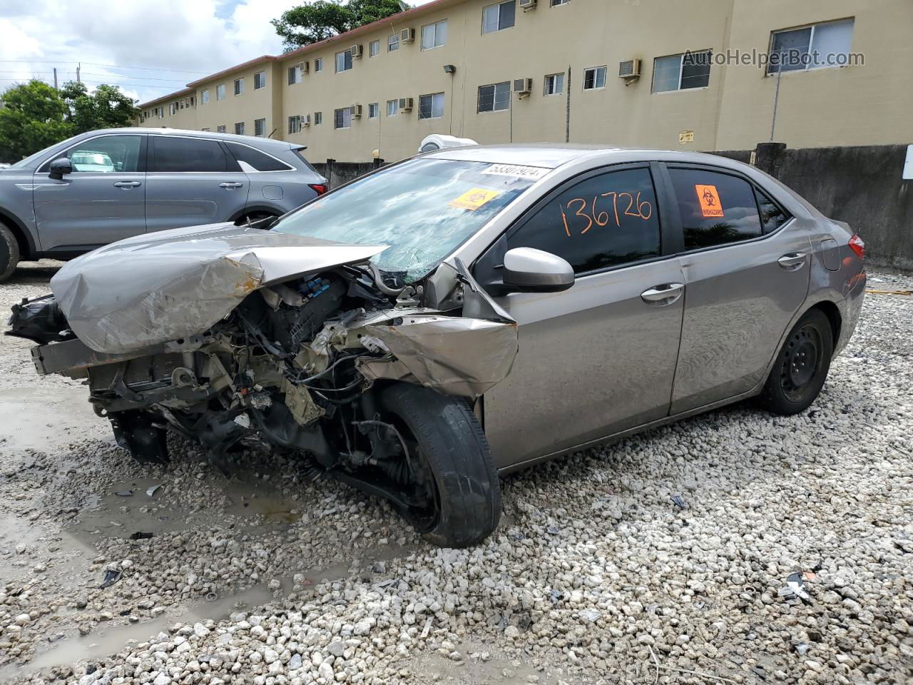 2015 Toyota Corolla L Tan vin: 5YFBURHE0FP342967