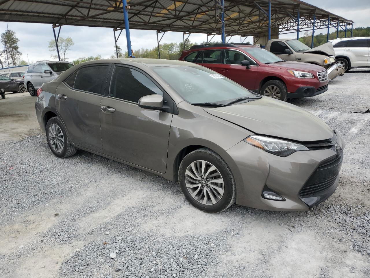 2017 Toyota Corolla L Tan vin: 5YFBURHE0HP651499