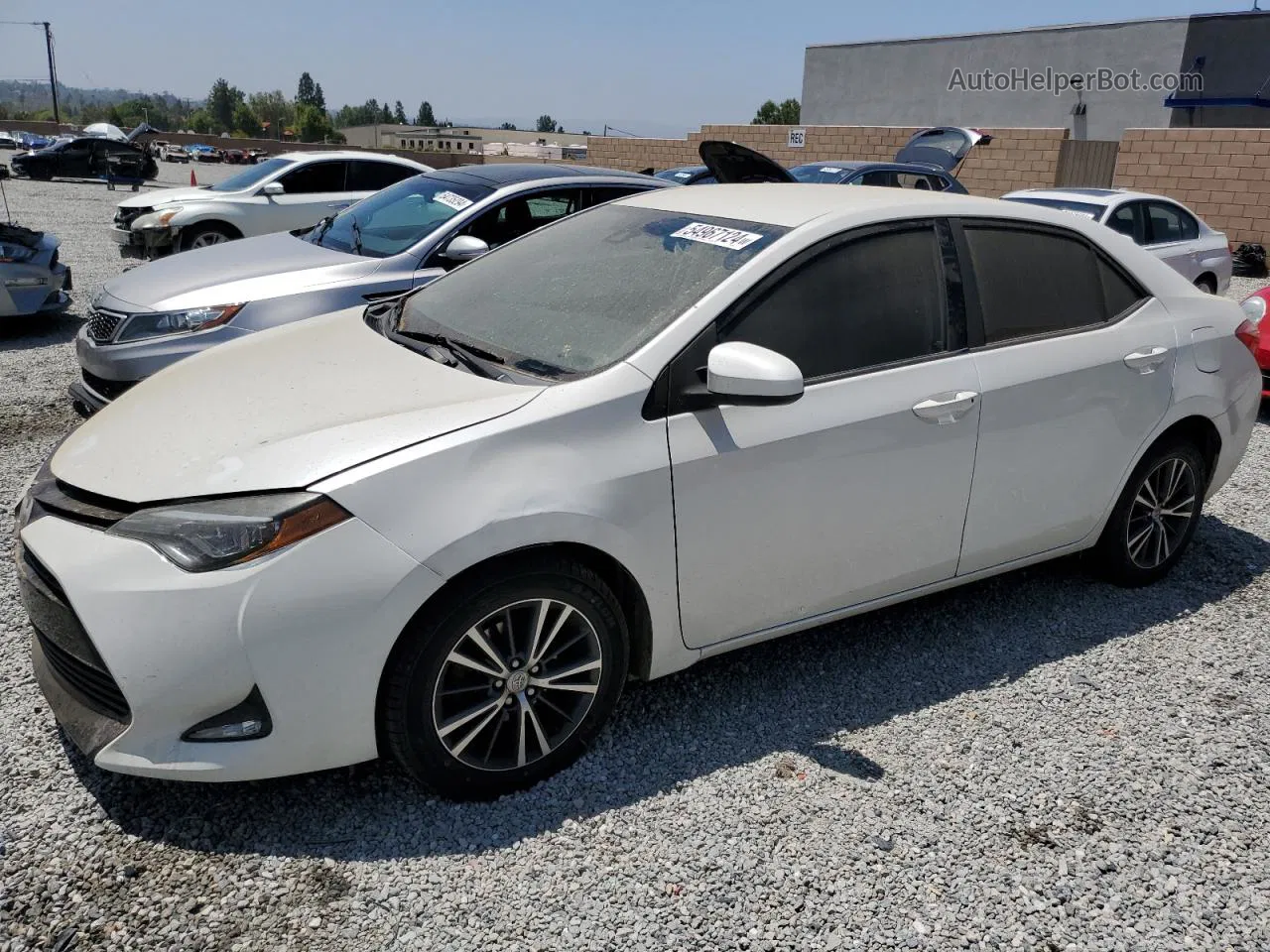 2017 Toyota Corolla L White vin: 5YFBURHE1HP674631