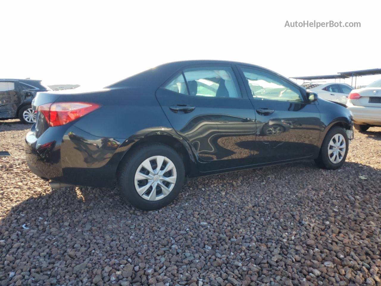 2017 Toyota Corolla L Черный vin: 5YFBURHE1HP687380