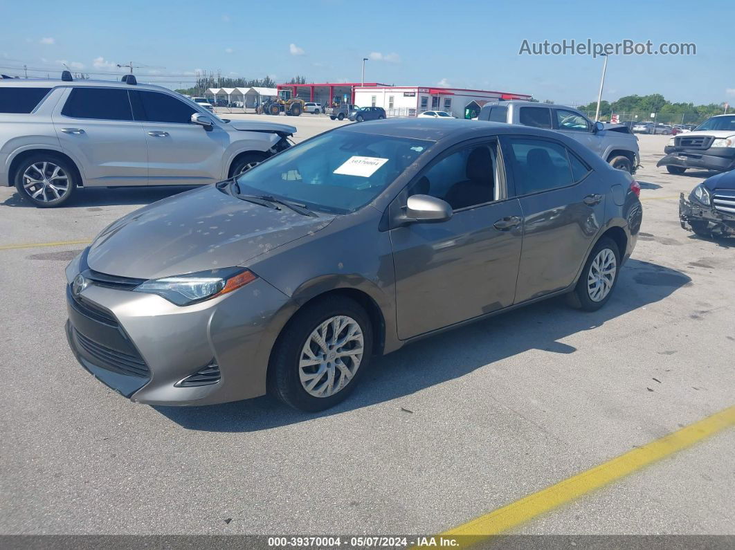 2019 Toyota Corolla Le Brown vin: 5YFBURHE1KP945243