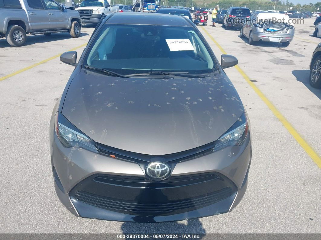 2019 Toyota Corolla Le Brown vin: 5YFBURHE1KP945243