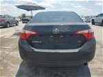 2016 Toyota Corolla L Черный vin: 5YFBURHE3GP514216